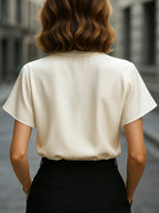 Asymmetric Buttoned Satin Blouse with Cutout Collar Detail