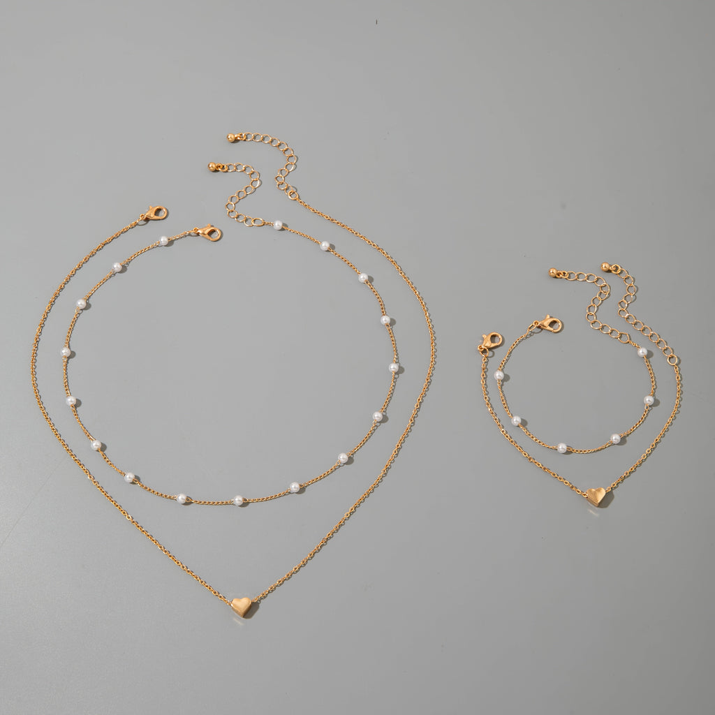 Indira | Modern Minimalist Heart & Pearl Necklace + Bracelet Set