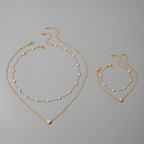 Indira | Modern Minimalist Heart & Pearl Necklace + Bracelet Set