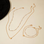 Indira | Modern Minimalist Heart & Pearl Necklace + Bracelet Set