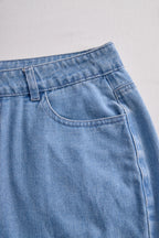 Stylish Denim Two-Piece Set With Asymmetrical Top And Fringed Skirt