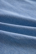 Stylish Denim Two-Piece Set With Asymmetrical Top And Fringed Skirt