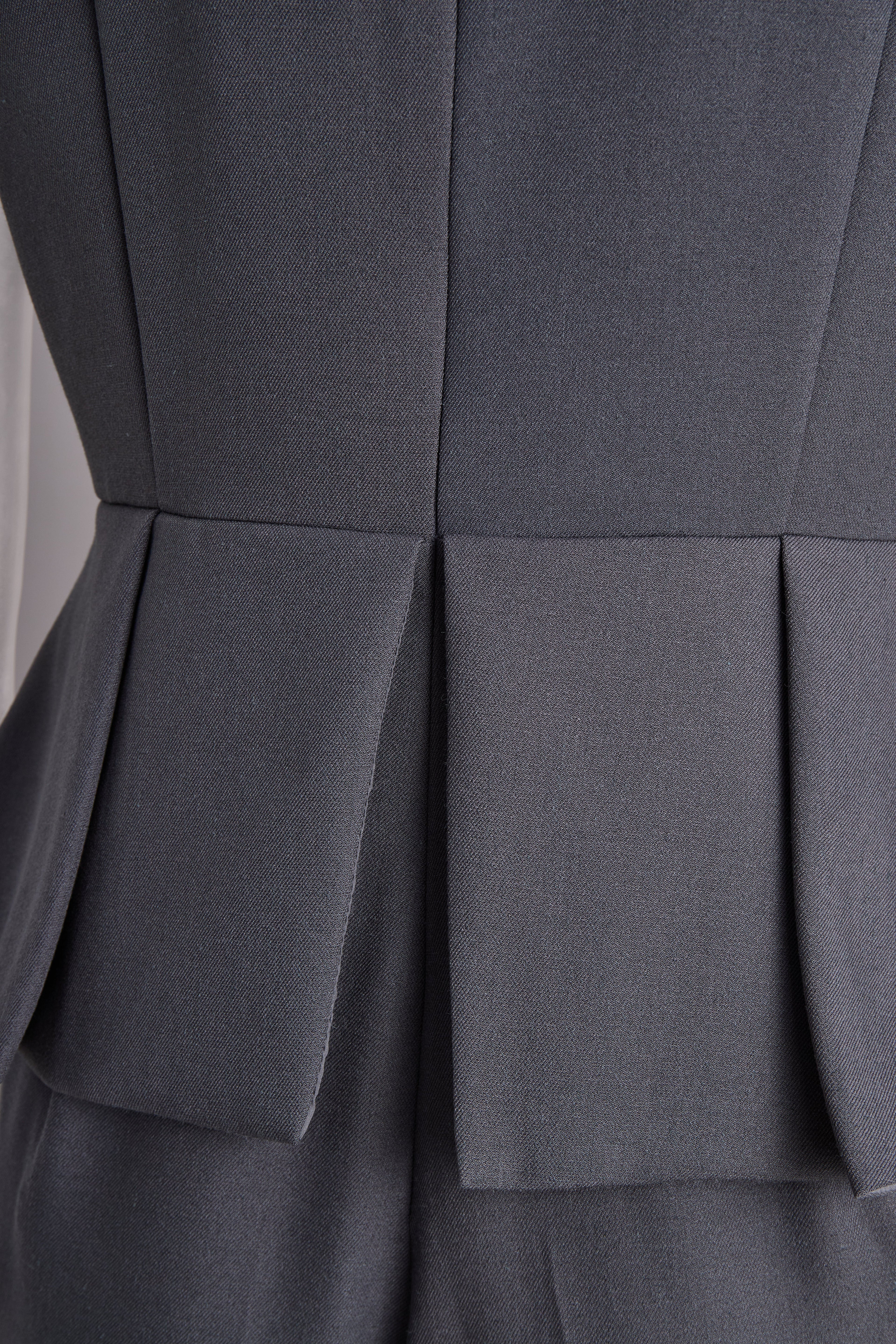 Sophisticated Sleeveless Peplum Jumpsuit In Charcoal Gray