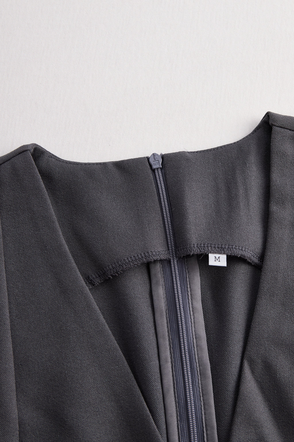 Sophisticated Sleeveless Peplum Jumpsuit In Charcoal Gray