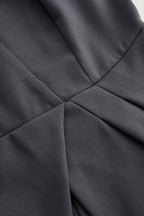 Sophisticated Sleeveless Peplum Jumpsuit In Charcoal Gray