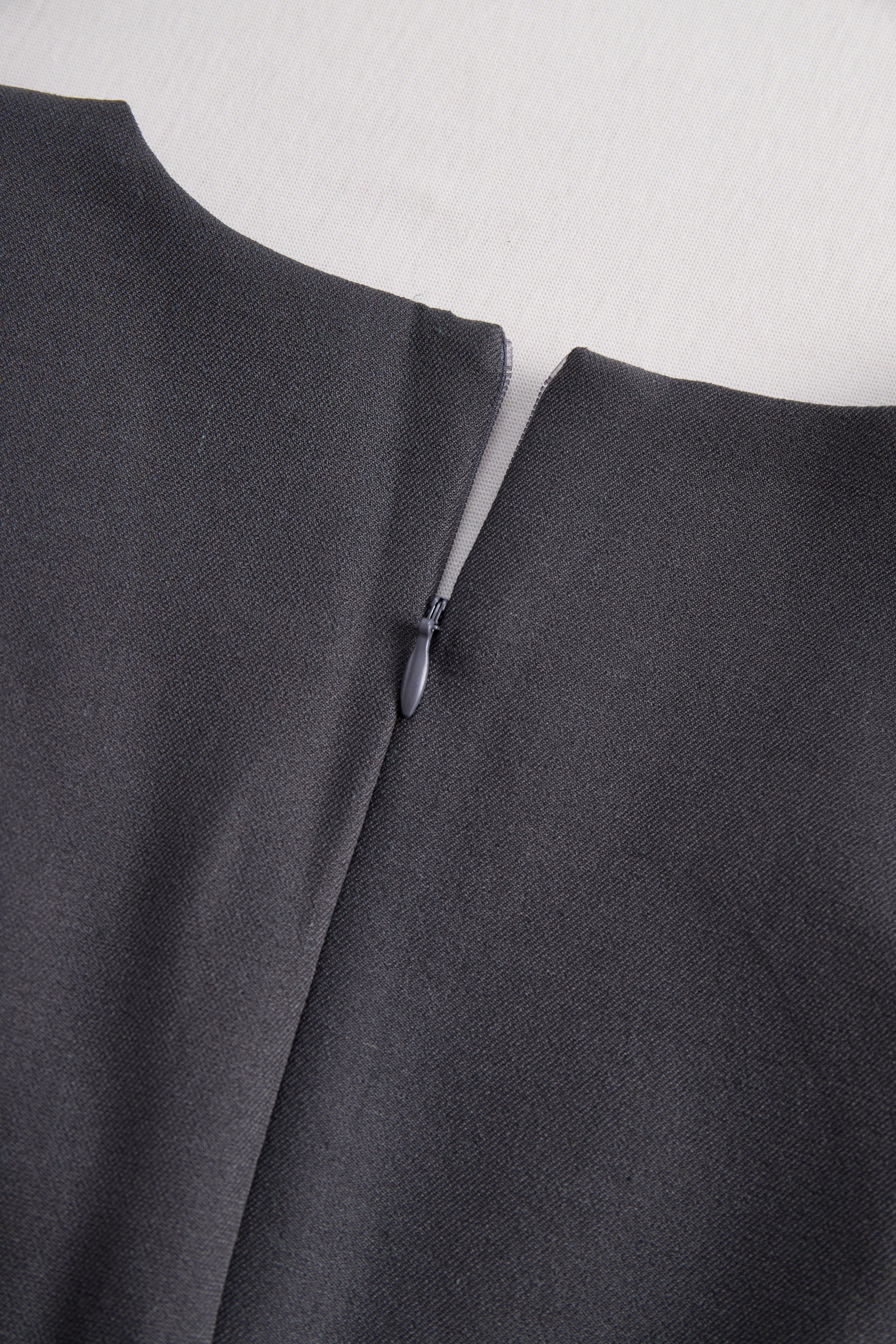 Sophisticated Sleeveless Peplum Jumpsuit In Charcoal Gray